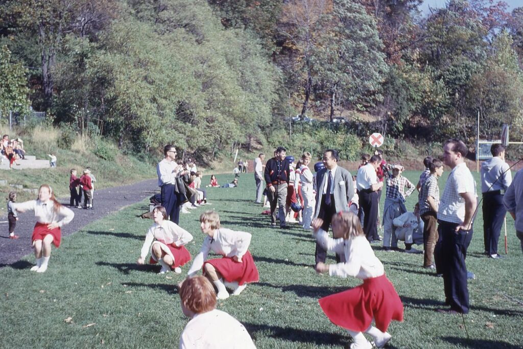 Hastings Rams cheerleaders performing at a Rams Football game in 1966.