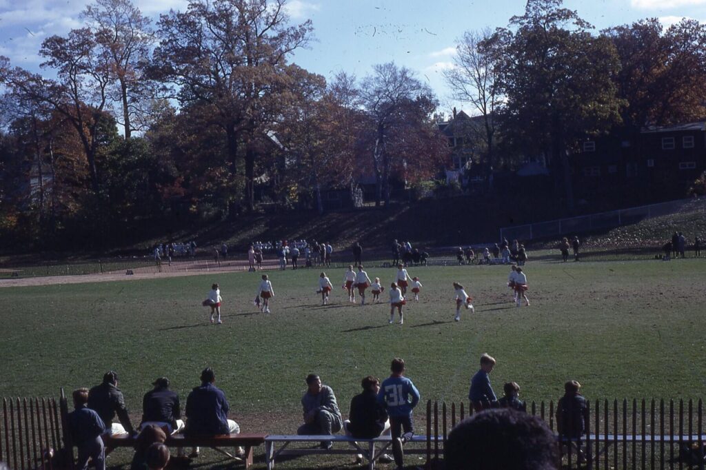 Hastings Rams Cheerleaders on the field probably during halftime at a Rams football game in 1967