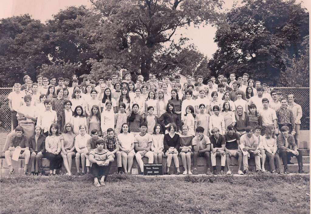 HHS Class of 1969 in the bleachers at Reynolds Field in June 1969