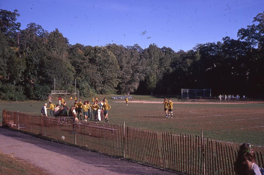HHS Varsity Soccer team on the sidelines during a game in 1971