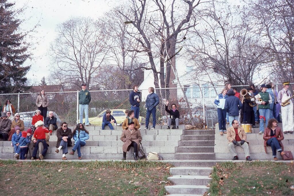 Crowd in the bleachers at Reynolds watching an alumni soccer game Thanksgiving Weekend 1978