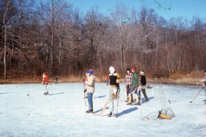 A break in the action in a hockey game at Sugar Pond in 1975