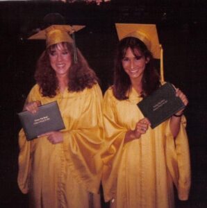 HHS Graduation 1980 – 2 grads showing off their diplomas