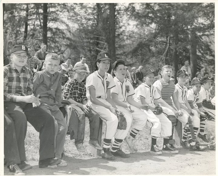 Little League team on a bench in the 1950’s.  Most likely the Lions.
