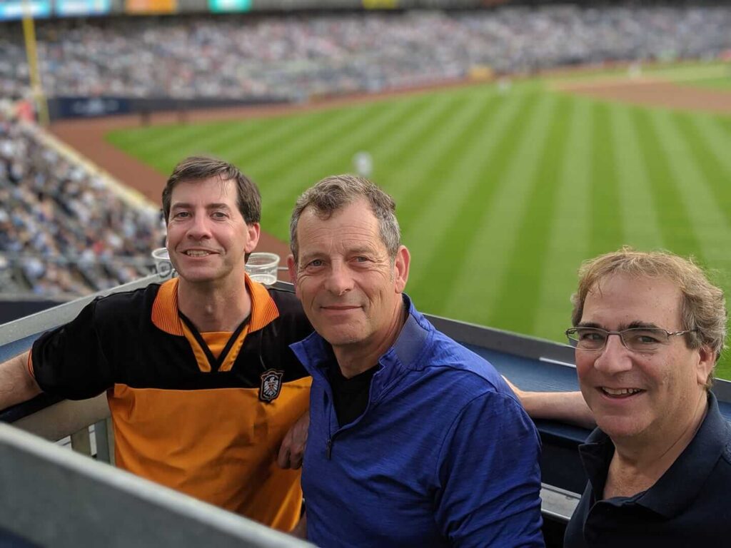 Jeremy Galland, Dan Lessing, and Jeff Edelman at Yankee Stadium in 2019.