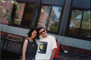 Liz Rice and David Lopez outside the school in 1991.