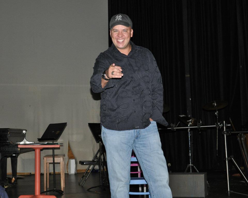 Paul Baya, HHS 1991, on the high school stage during a school tour during his 20th reunion in 2011.