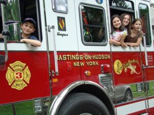 Kids in the firetruck on Memorial Day 2009