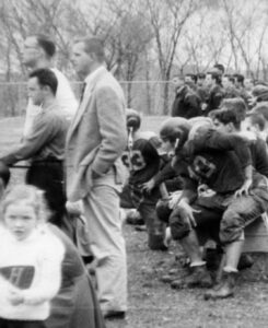 Coaches Ken Rees, Ron Feaster, Dick Bub.  And players.  Almost definitely 1957.