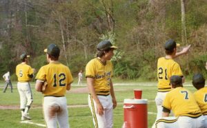Richard Lovejoy by the water cooler.  Hastings Varsity Baseball, 1990.