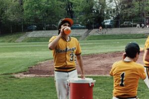 Richard Lovejoy having a drink by the water cooler.  Hastings Varsity Baseball, 1990.