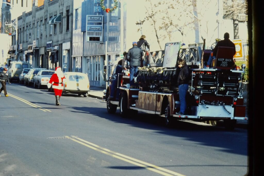 Santa Claus in downtown Hastings by one of the firetrucks in the 1970’s