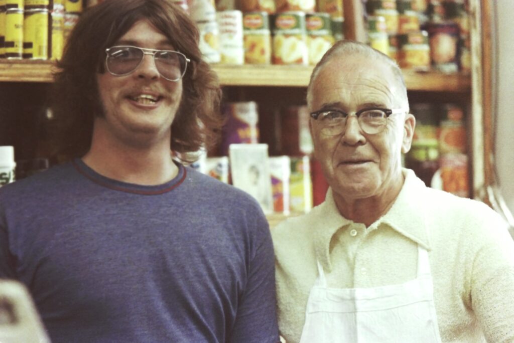 John Fagan and Jim Dolan working at Logue’s Deli in the 1970’s