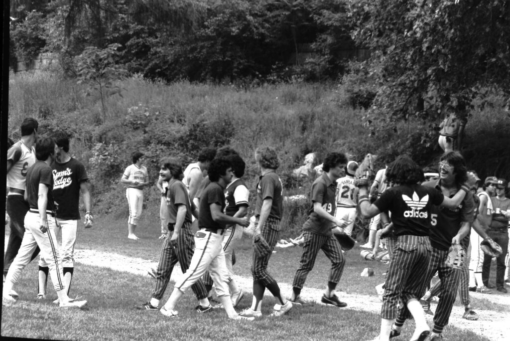 Handshakes after an adult men’s softball game at Zinsser Park