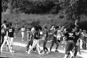Handshakes after an adult men’s softball game at Zinsser Park