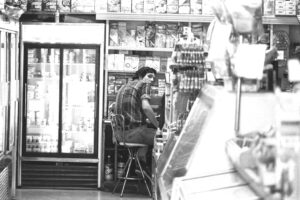 Chip Bingham working at Logue’s Delicatessen in the 1970’s