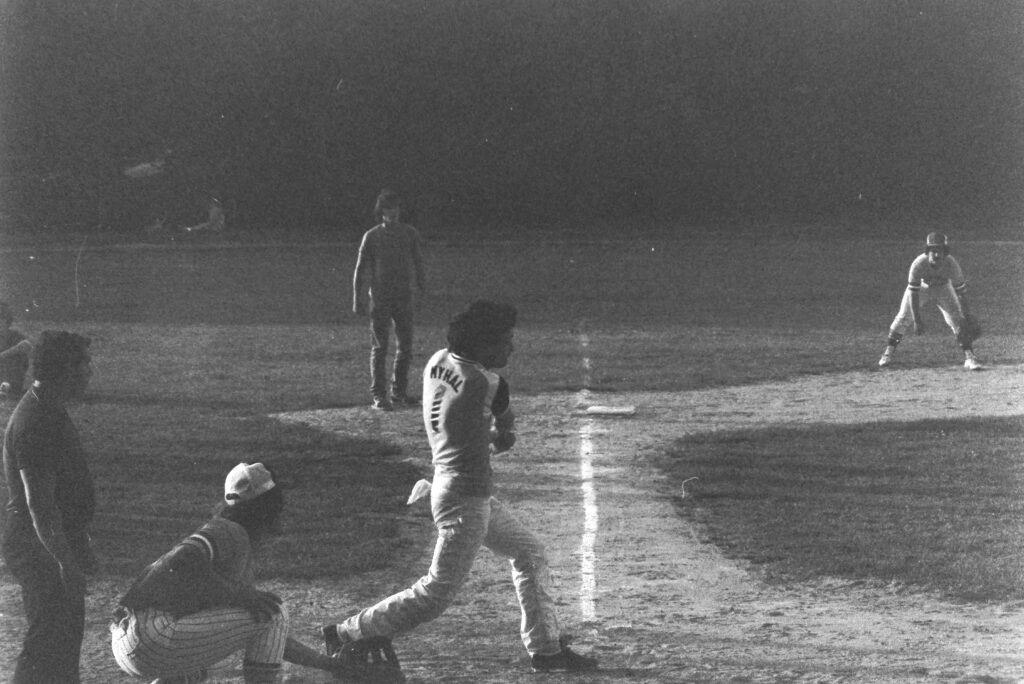 Andrew Myhal up at bat at an adult softball game